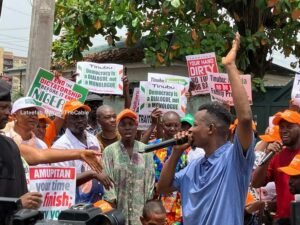 ADC youths protest at INEC office, demand Amupitan’s resignation