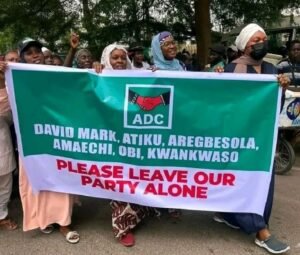 ‘Leave our party alone’: ADC women tell Mark, Atiku, Obi ADC supporters protest holding banner telling Nigerian politicians to stay away from party