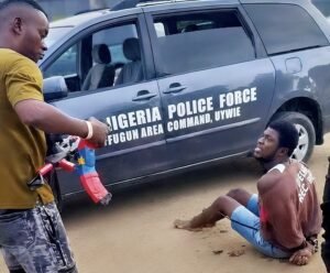 Restrained suspect moments before being shot by police officer in Delta State