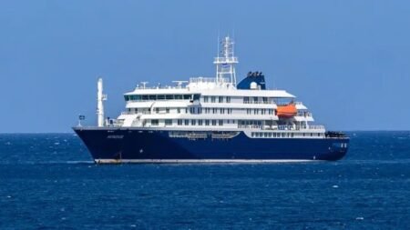 WHO oversees evacuation of Hantavirus-hit cruise ship in Spain The MV Hondius cruise ship anchored offshore near Tenerife during emergency Hantavirus evacuation operations.