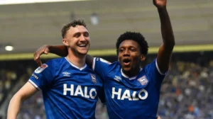 Ipswich Town players celebrate Premier League promotion after defeating Queens Park Rangers at Portman Road