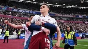 Arsenal forward Leandro Trossard celebrates after scoring a late winner against West Ham at the London Stadium.