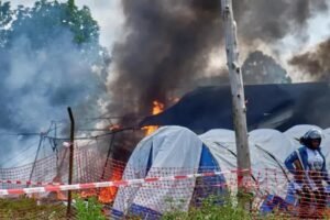 Irate mob sets Ebola hospital on fire in DR Congo