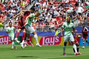 Qatar stun Switzerland with last-gasp equaliser for first-ever World Cup point