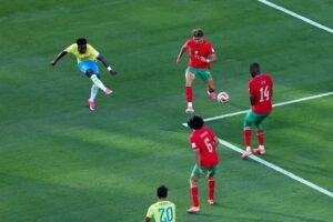 Vinicius Jr scores brilliant goal as Brazil come from behind to draw with Morocco in Group C opener.