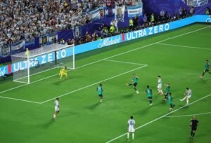 Messi hat-trick equals World Cup scoring record as Argentina thrash Algeria Argentina's Lionel Messi scores their third goal past Algeria's Luca Zidane to complete his hat-trick