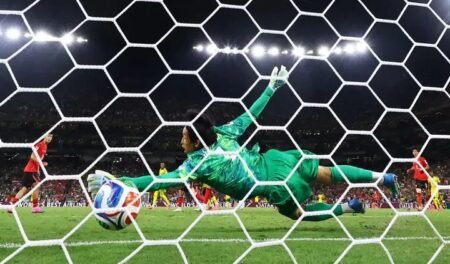 South Africa's Thapelo Maseko scores their first goal past South Korea's Kim Seung-gyu