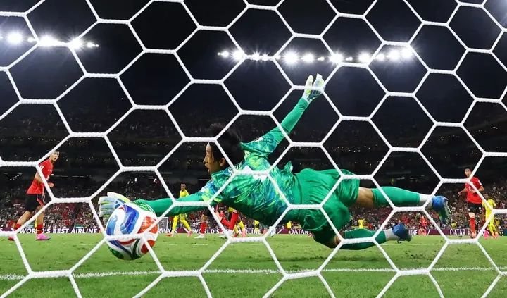 South Africa's Thapelo Maseko scores their first goal past South Korea's Kim Seung-gyu