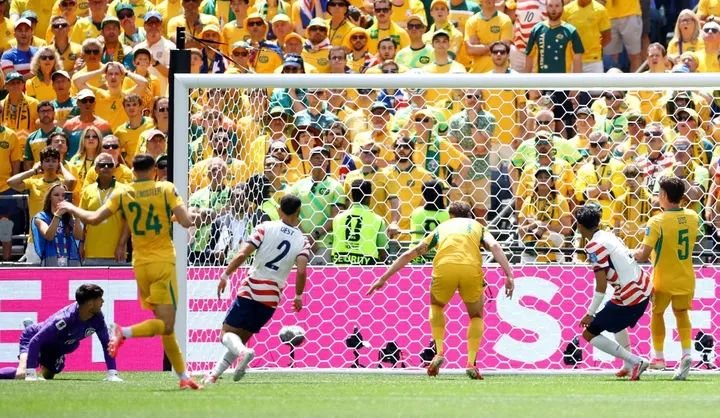 US advance to last-32 in win over Australia US outclass Australia in 2-0 win