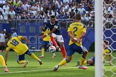 Kylian Mbappe shoots and scores as France beat Sweden 3-0