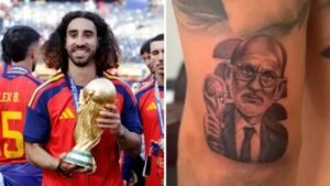 Cucurella gets tattoo of Spain coach De la Fuente Spain defender Marc Cucurella shows off a new tattoo of coach Luis de la Fuente holding the World Cup trophy