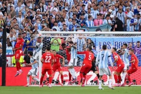 Mac Allister heads Argentina in front in a win over Switzerland.