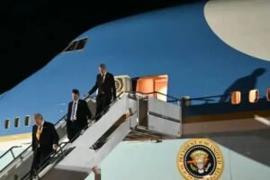 Donald Trump alighting Air Force One during his departure from Turkey after the NATO summit