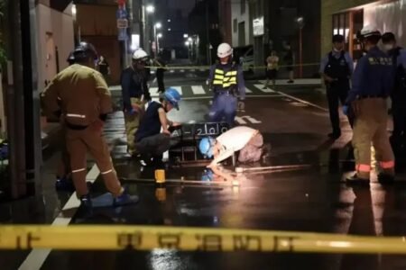 Firefighters respond to a burst water pipe in Tokyo after a magnitude-5.9 earthquake struck the region.
