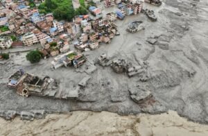 Nepal-Tibet floods leave over 360 dead, 1,400 missing A drone view shows mud covering properties following a flash flood in Trishuli, Nuwakot district, Nepal