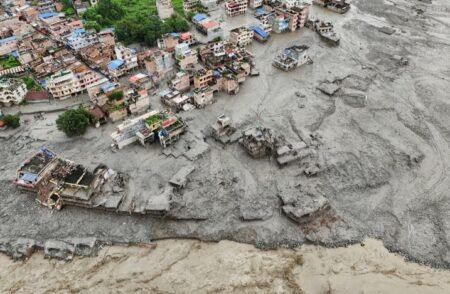Nepal-Tibet floods leave over 360 dead, 1,400 missing A drone view shows mud covering properties following a flash flood in Trishuli, Nuwakot district, Nepal