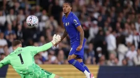 Joao Pedro lifts the ball over Bernd Leno to score Chelsea’s fastest-ever opening-round goal in Premier League history.