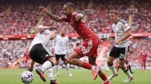 Fulham players celebrate draw at Liverpool