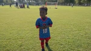 Three-year-old football player Nevada during a youth football match in Florida