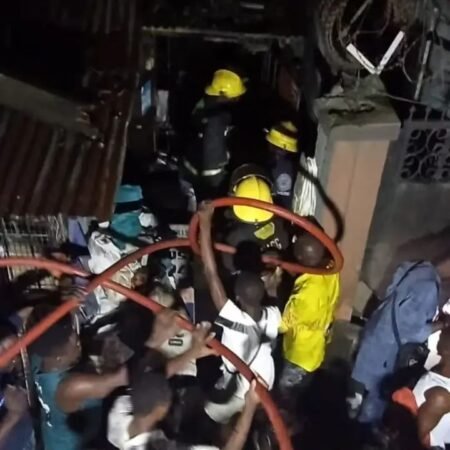 Firefighters tackle blaze at residential buildings