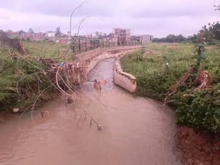 Flood-damaged access road and bridge in Ibadan, Oyo State
